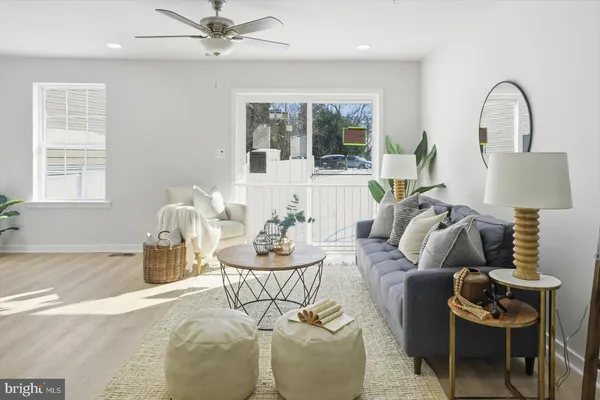a living room with furniture and window