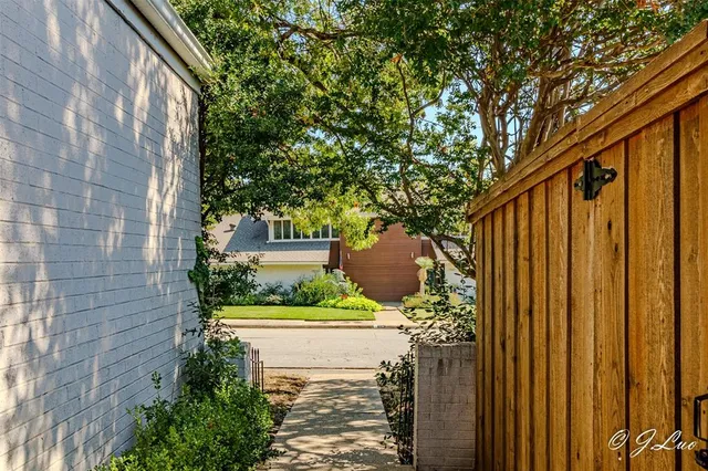 a view of balcony with wooden floor