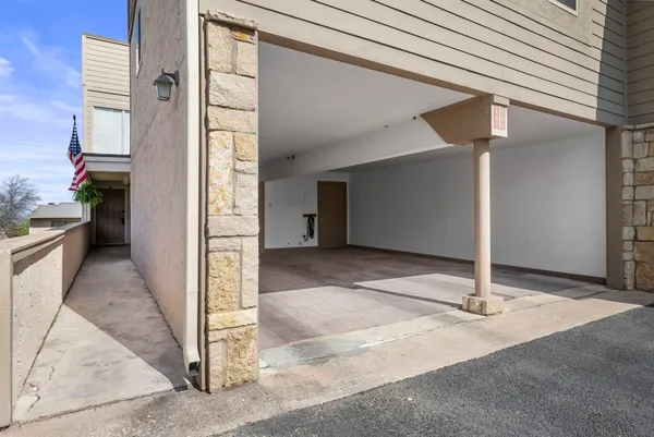 a view of a house with a street