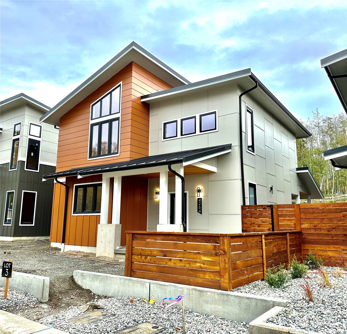 4264 Creston Way Bellingham, WA 98226 - Photo 1 of 6 a front view of a house with large windows