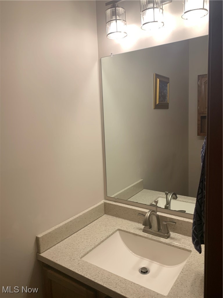 9046 Shepard Road Macedonia, OH 44056 - Photo 13 of 33 First floor half Bath with vanity