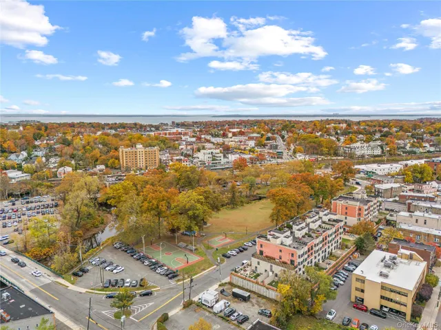 an aerial view of residential building with parking space