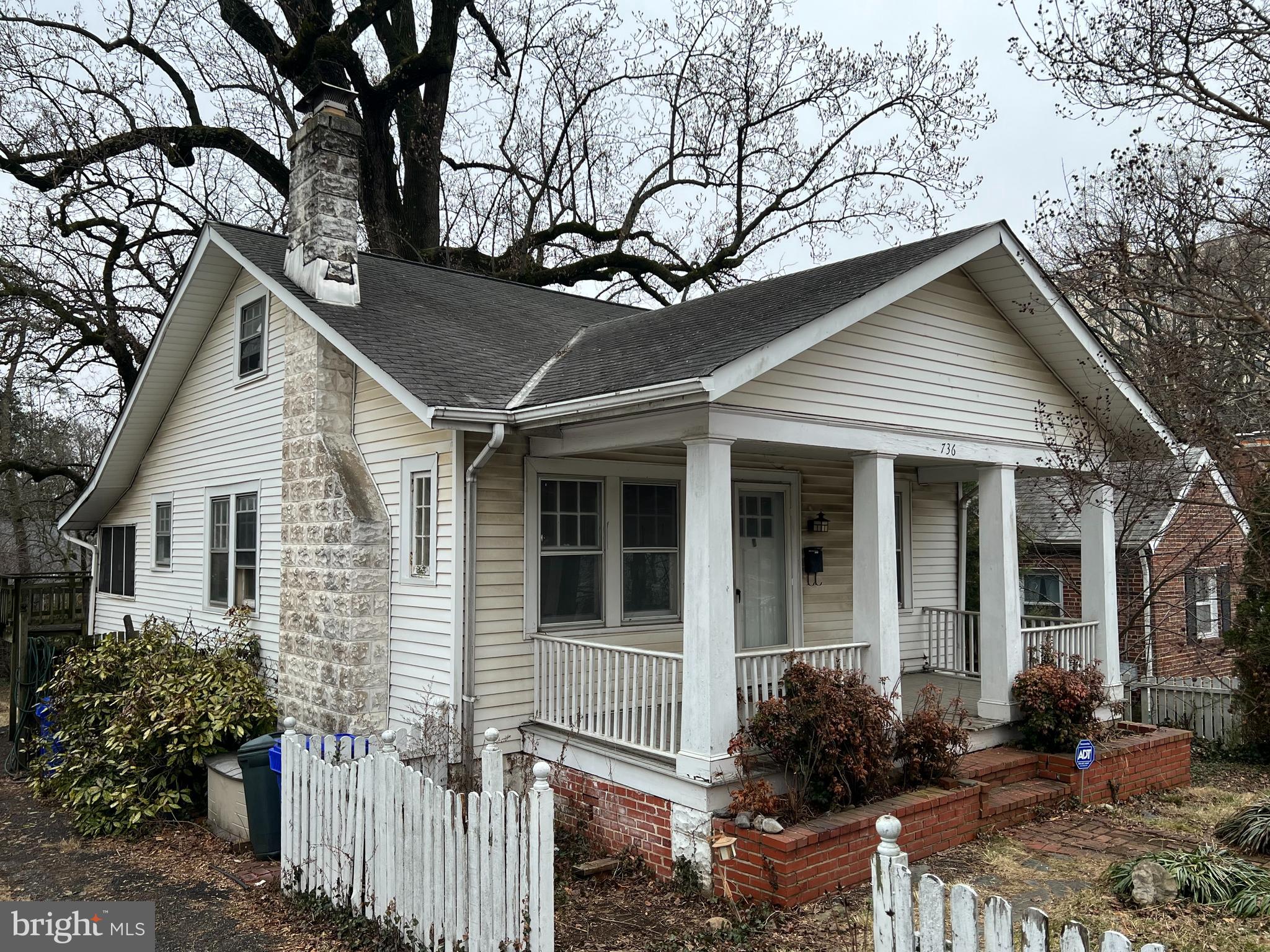 736 Easley Street Silver Spring, MD 20910 - Photo 2 of 51 a front view of a house with garden