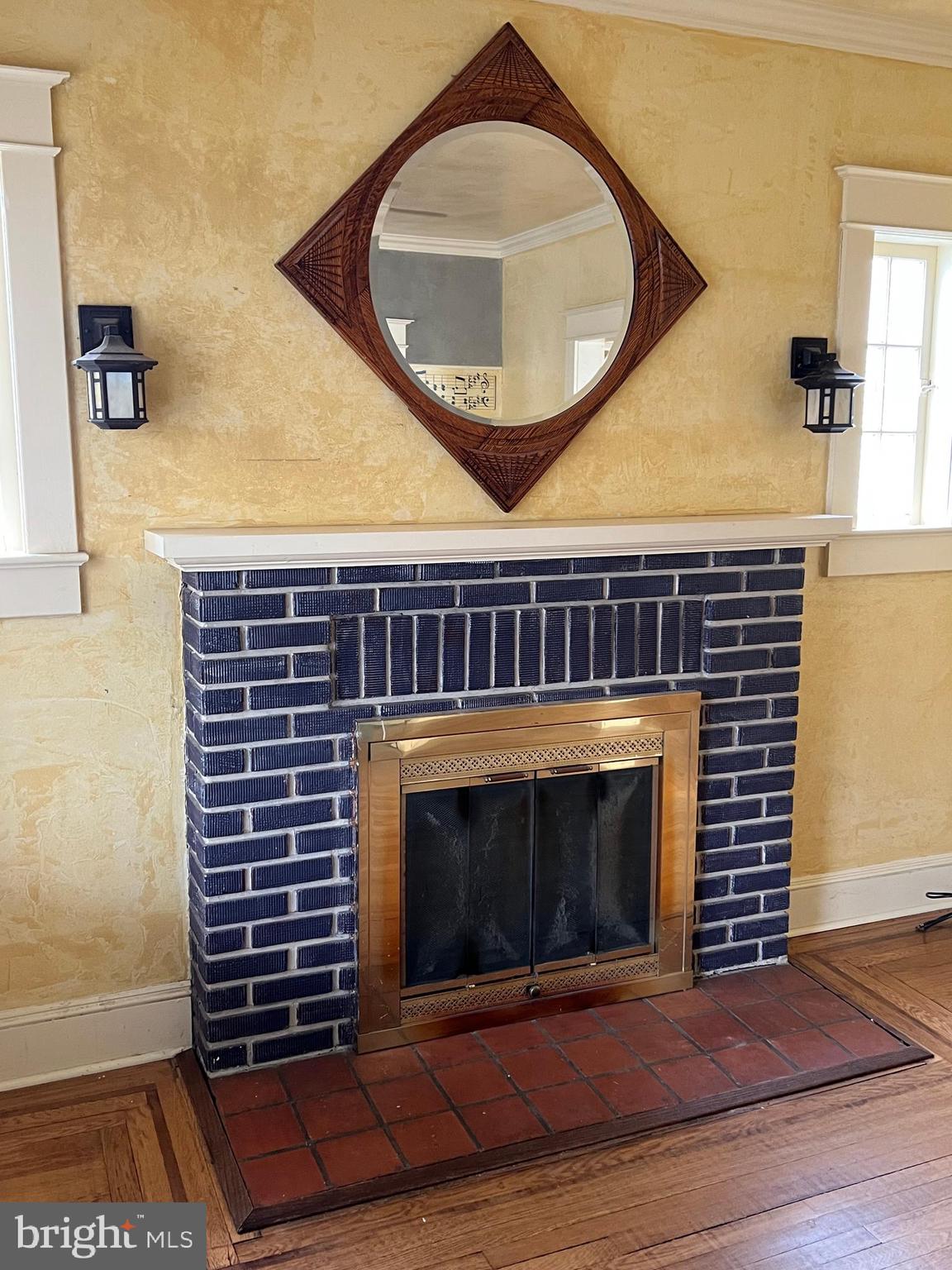 736 Easley Street Silver Spring, MD 20910 - Photo 29 of 51 a living room with a fireplace and a rug