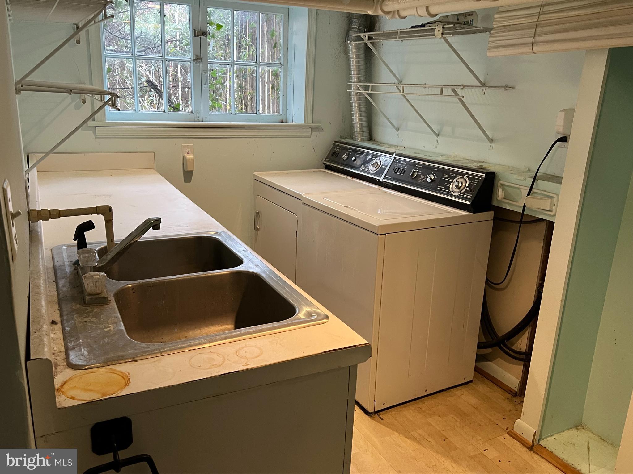 736 Easley Street Silver Spring, MD 20910 - Photo 42 of 51 a utility room with dryer and washer