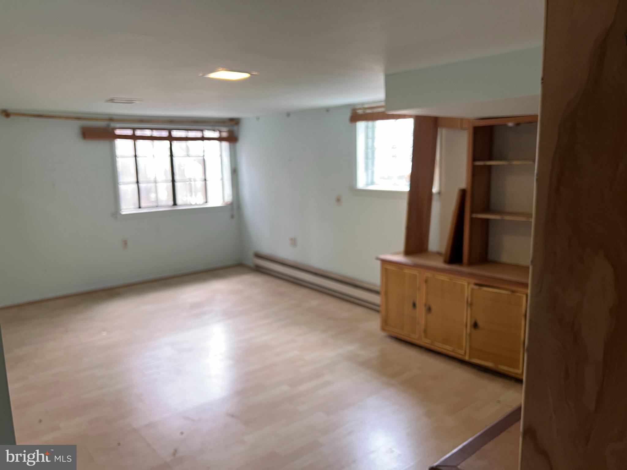 736 Easley Street Silver Spring, MD 20910 - Photo 44 of 51 an empty room with windows