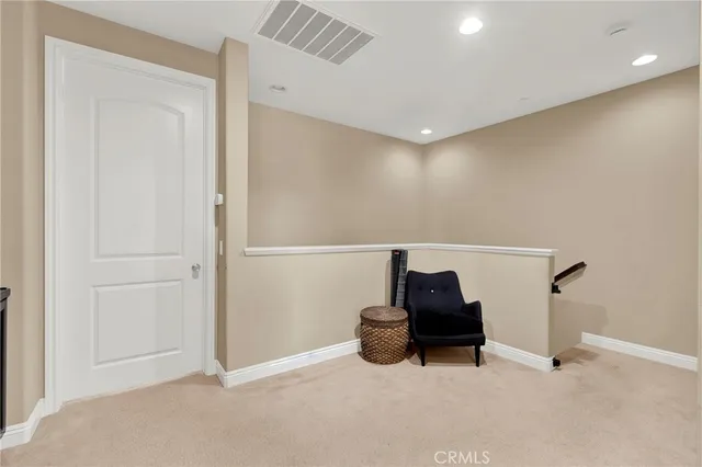 a view of a kitchen from the hallway