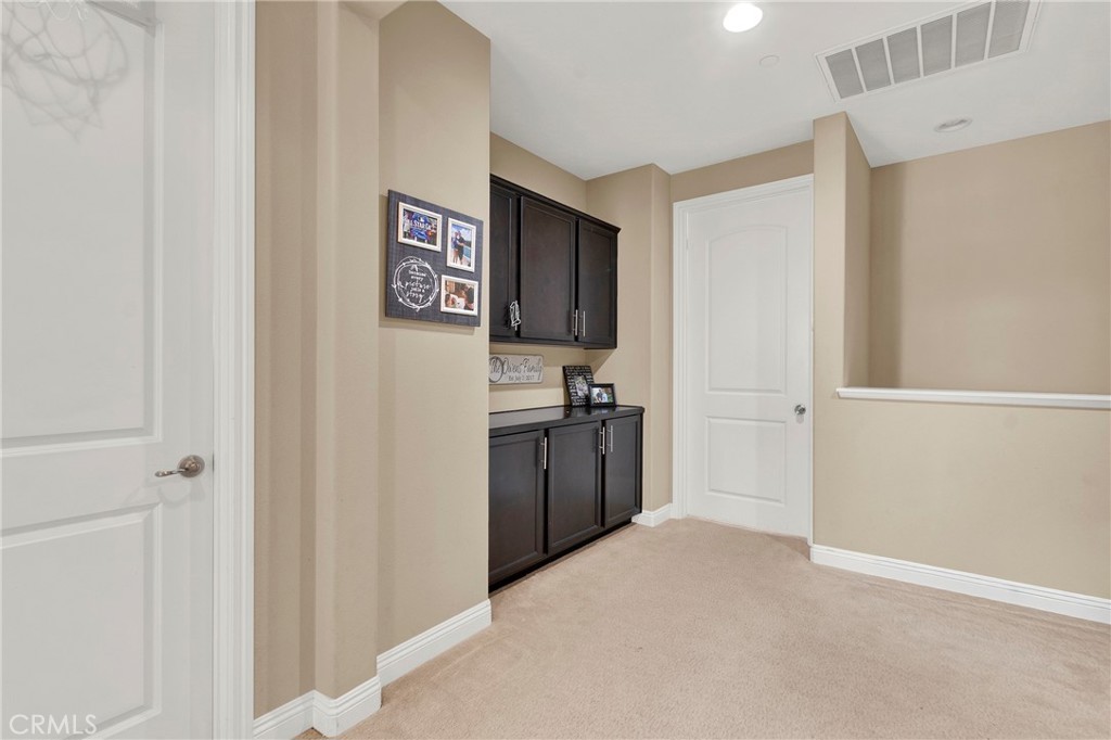 2 Sevilla Rancho Santa Margarita, CA 92688 - Photo 12 of 32 a view of a kitchen from the hallway