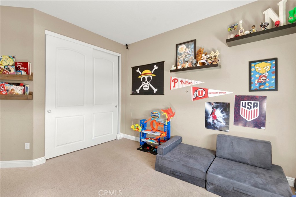 2 Sevilla Rancho Santa Margarita, CA 92688 - Photo 21 of 32 a living room with furniture and a couch
