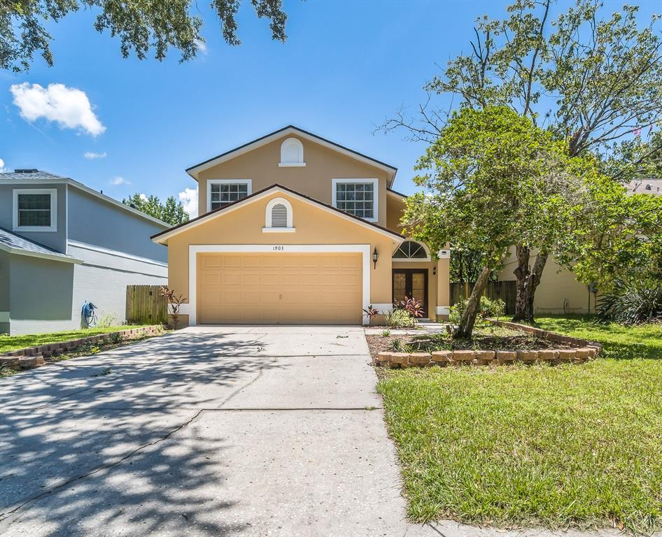 1903 Brandon Brook Road Valrico, FL 33594 - Photo 1 of 1 a front view of a house with a yard