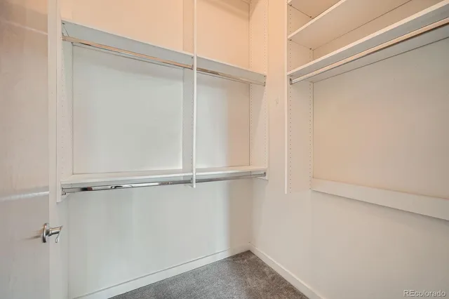 a view of an empty walk in closet