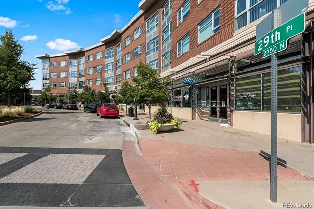 a view of street with sitting area