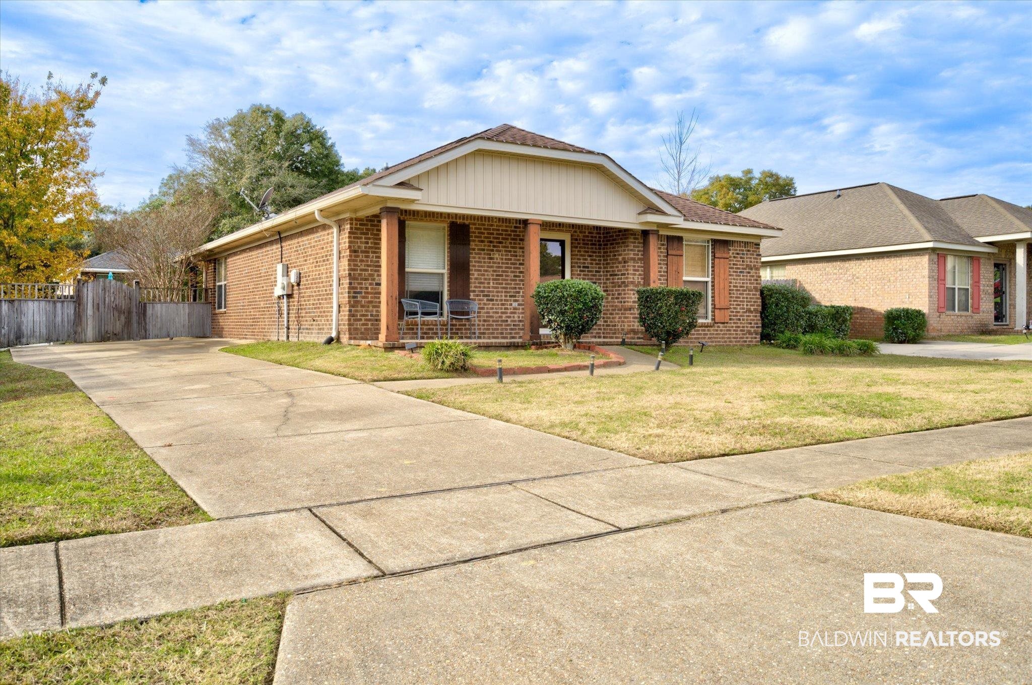 2855 Rebecca Drive West Mobile, AL 36618 - Photo 22 of 22 Ranch-style house with covered porch and a front lawn
