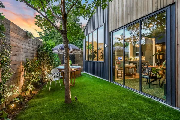 a garden view with a seating space