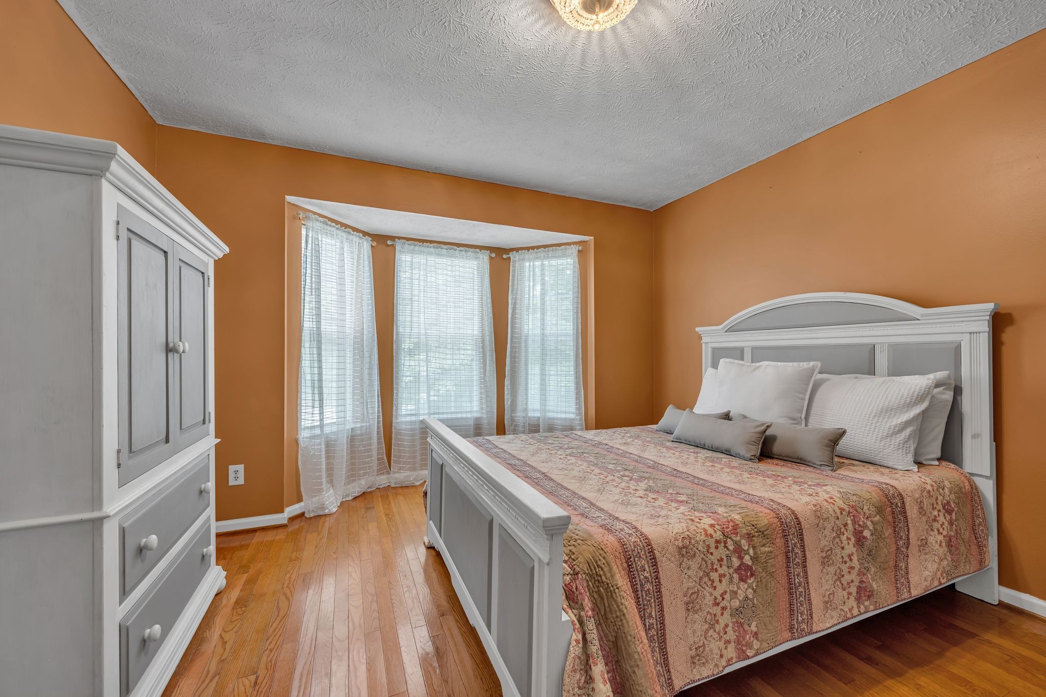 190 Gaskins Road Dickson, TN 37055 - Photo 16 of 25 a bedroom with a bed and a large window