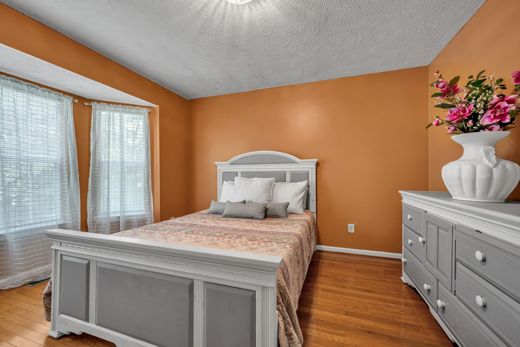 190 Gaskins Road Dickson, TN 37055 - Photo 17 of 25 a bedroom with a bed and a potted plant