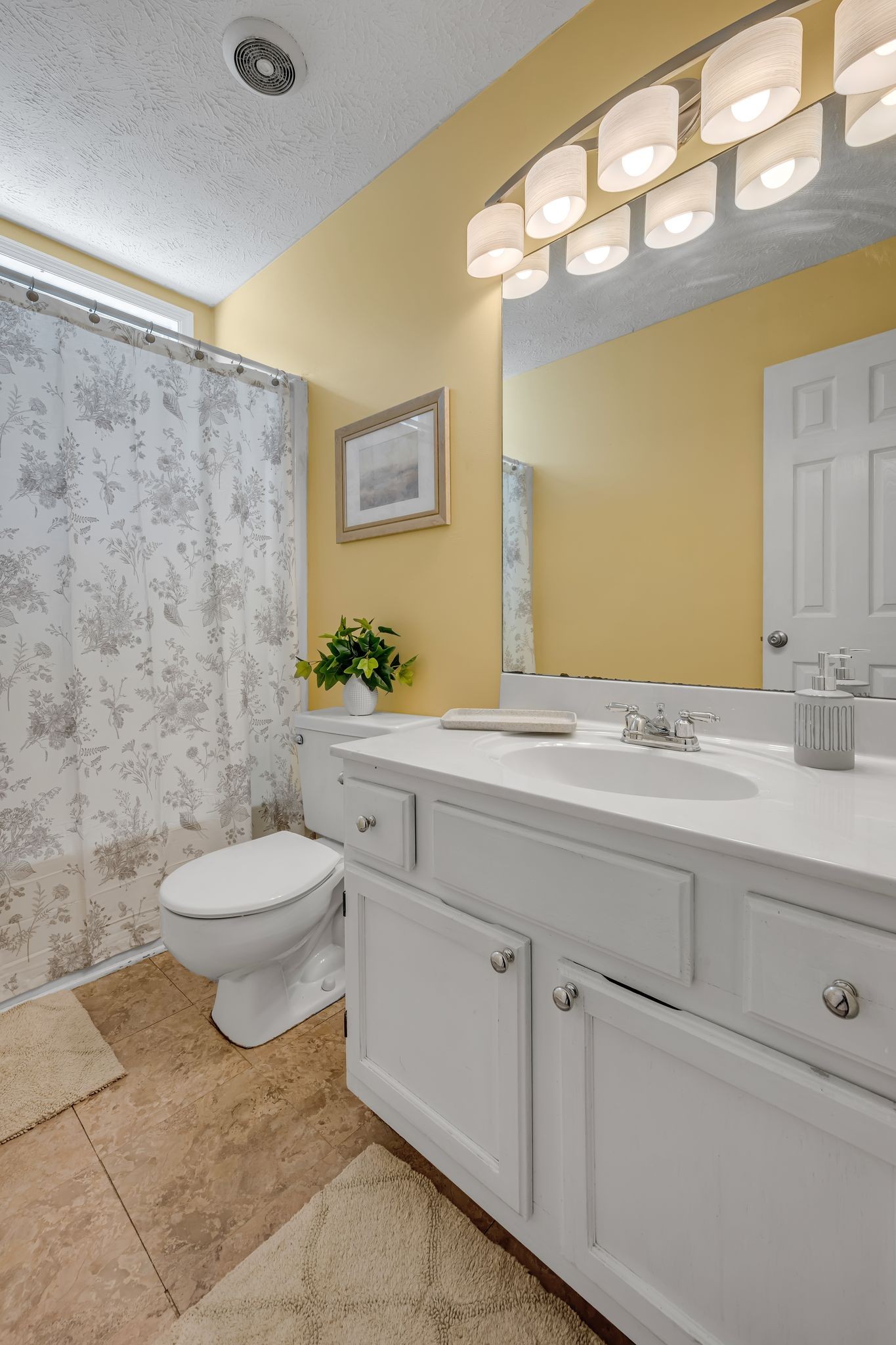 190 Gaskins Road Dickson, TN 37055 - Photo 20 of 25 a bathroom with a granite countertop toilet sink and mirror