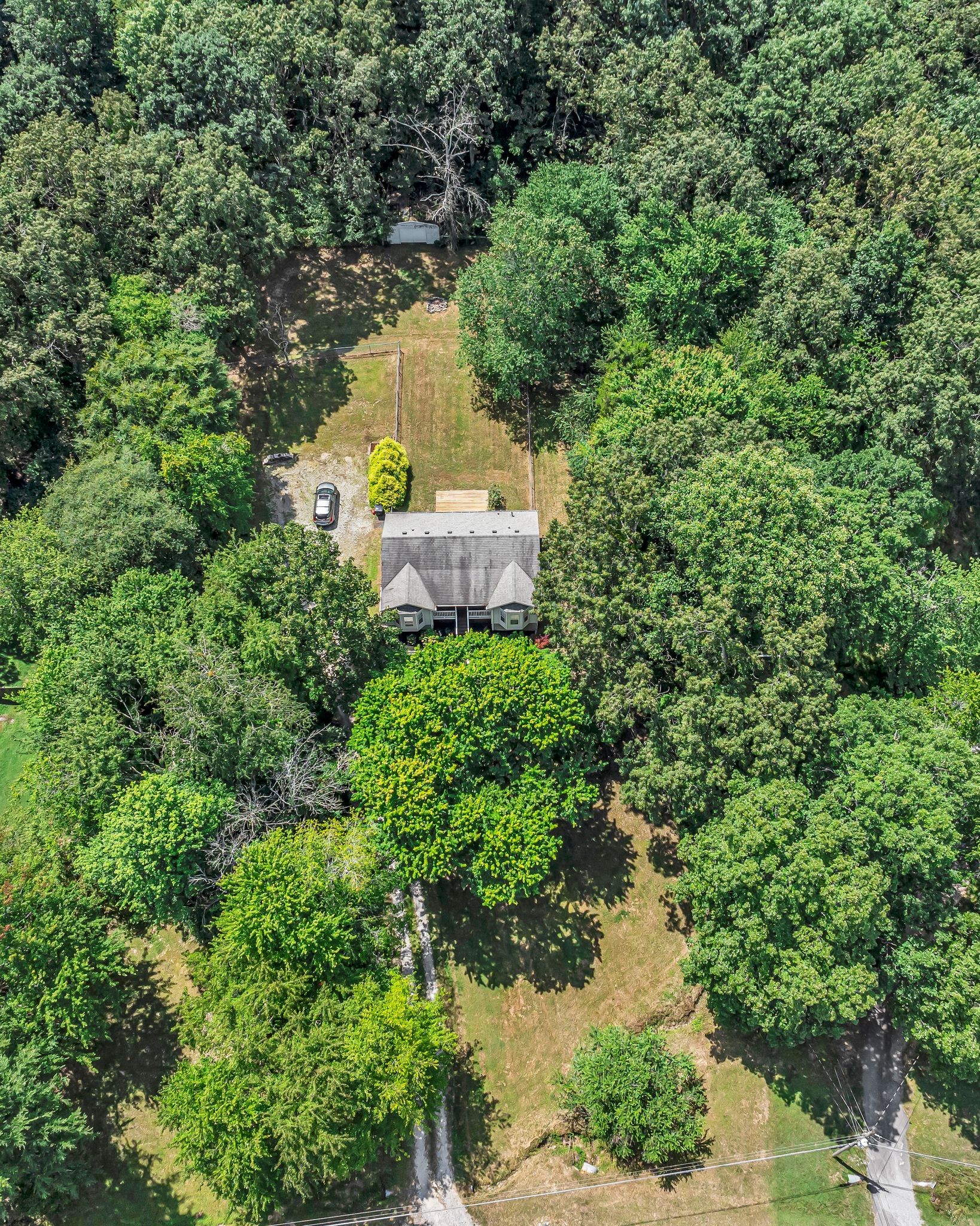 190 Gaskins Road Dickson, TN 37055 - Photo 25 of 25 an aerial view of a house with a yard