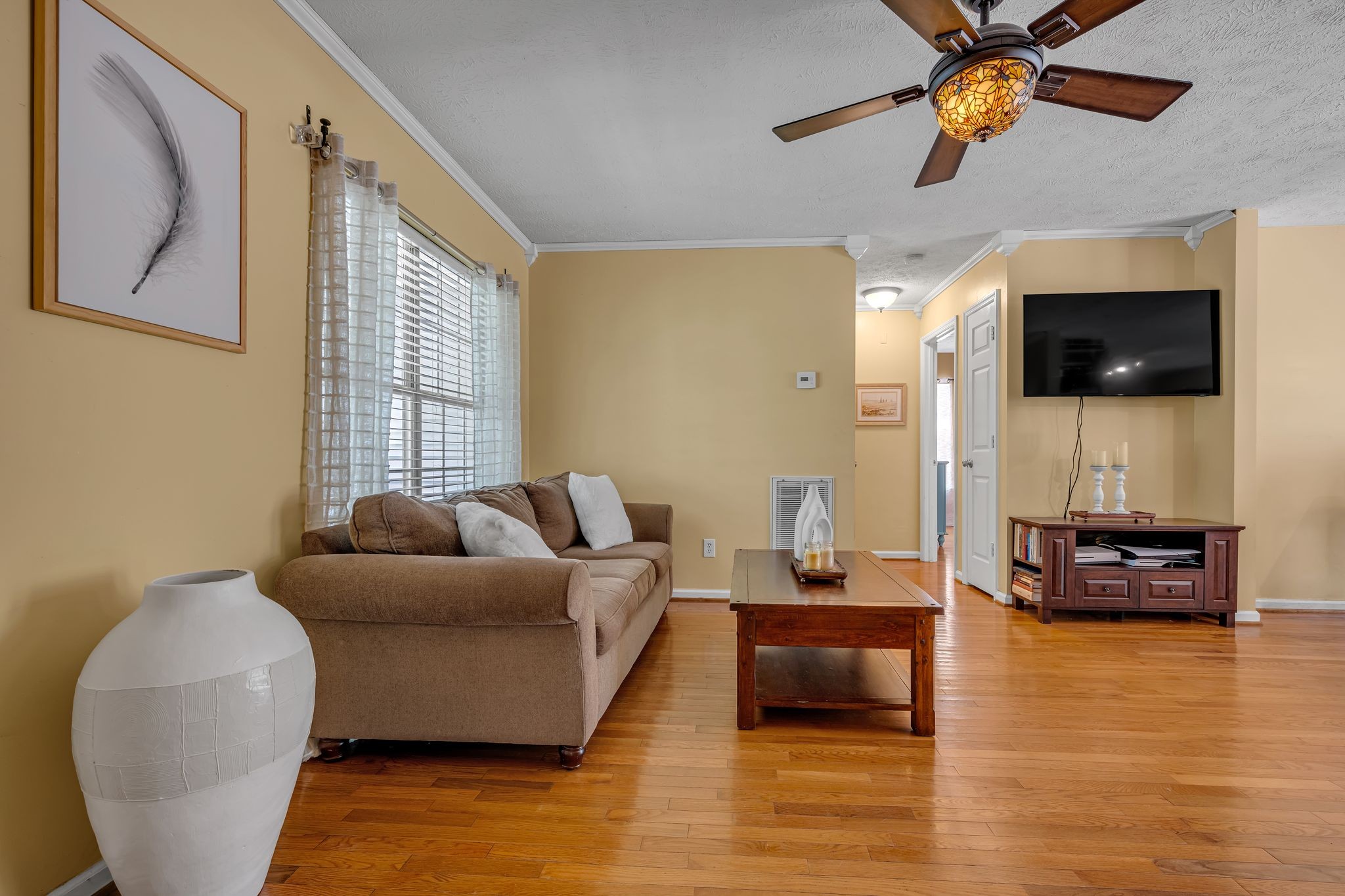 190 Gaskins Road Dickson, TN 37055 - Photo 3 of 25 a living room with furniture and a flat screen tv