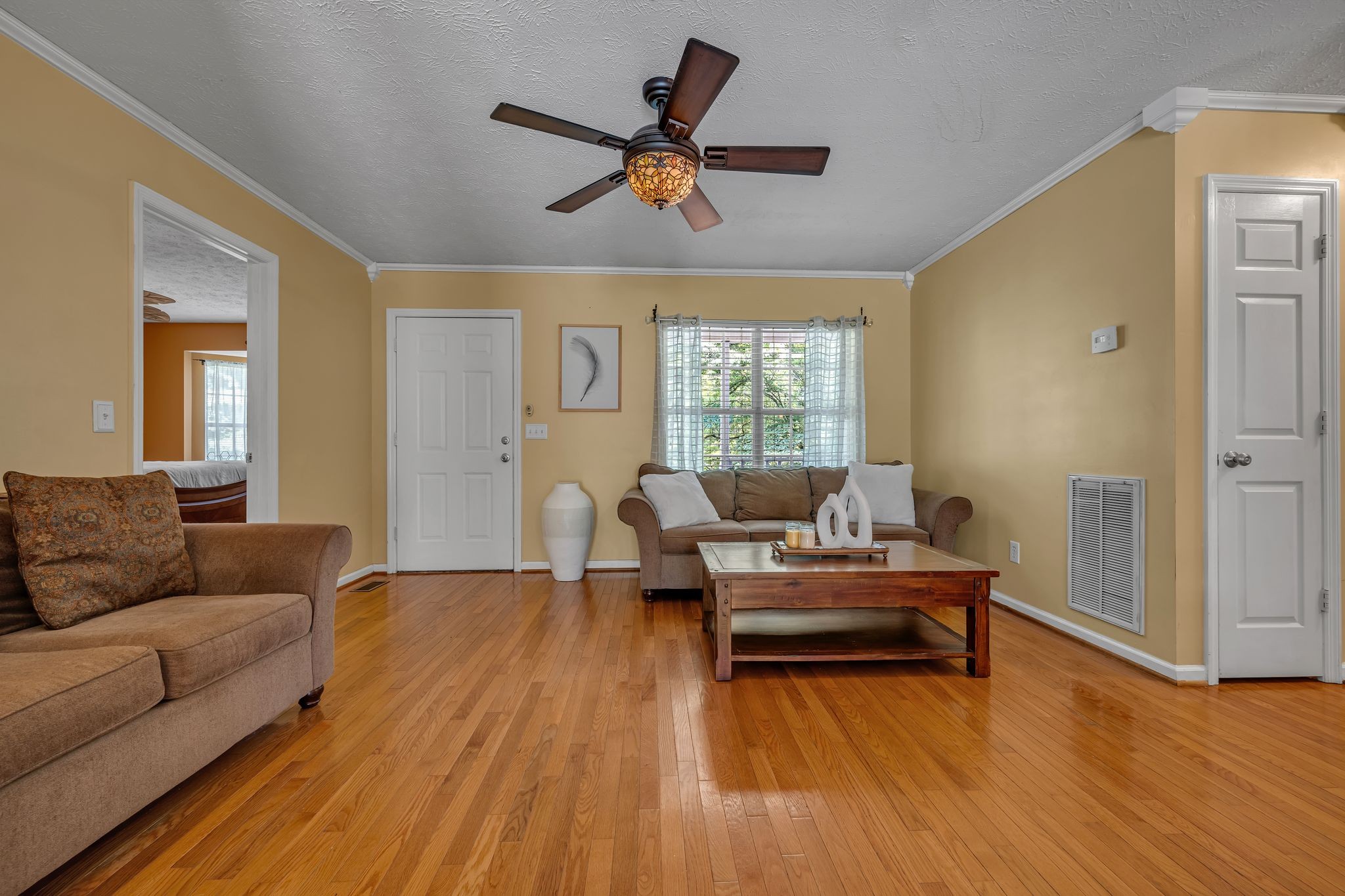 190 Gaskins Road Dickson, TN 37055 - Photo 4 of 25 a living room with furniture and a wooden floor