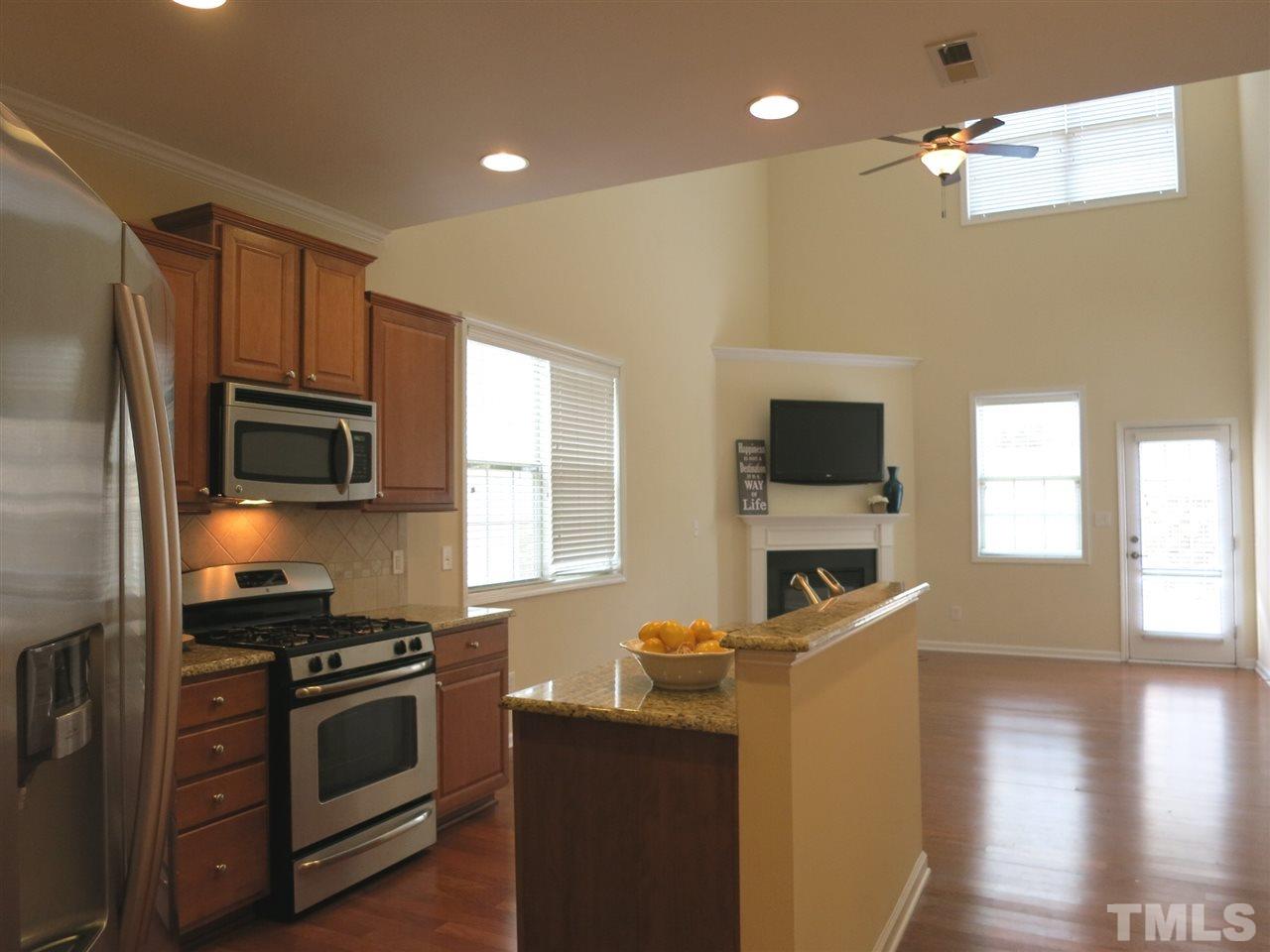 8357 Primanti Boulevard Raleigh, NC 27612 - Photo 24 of 25 This home features an open floorplan w/the Living Rm open to the Dining area & Kitchen.