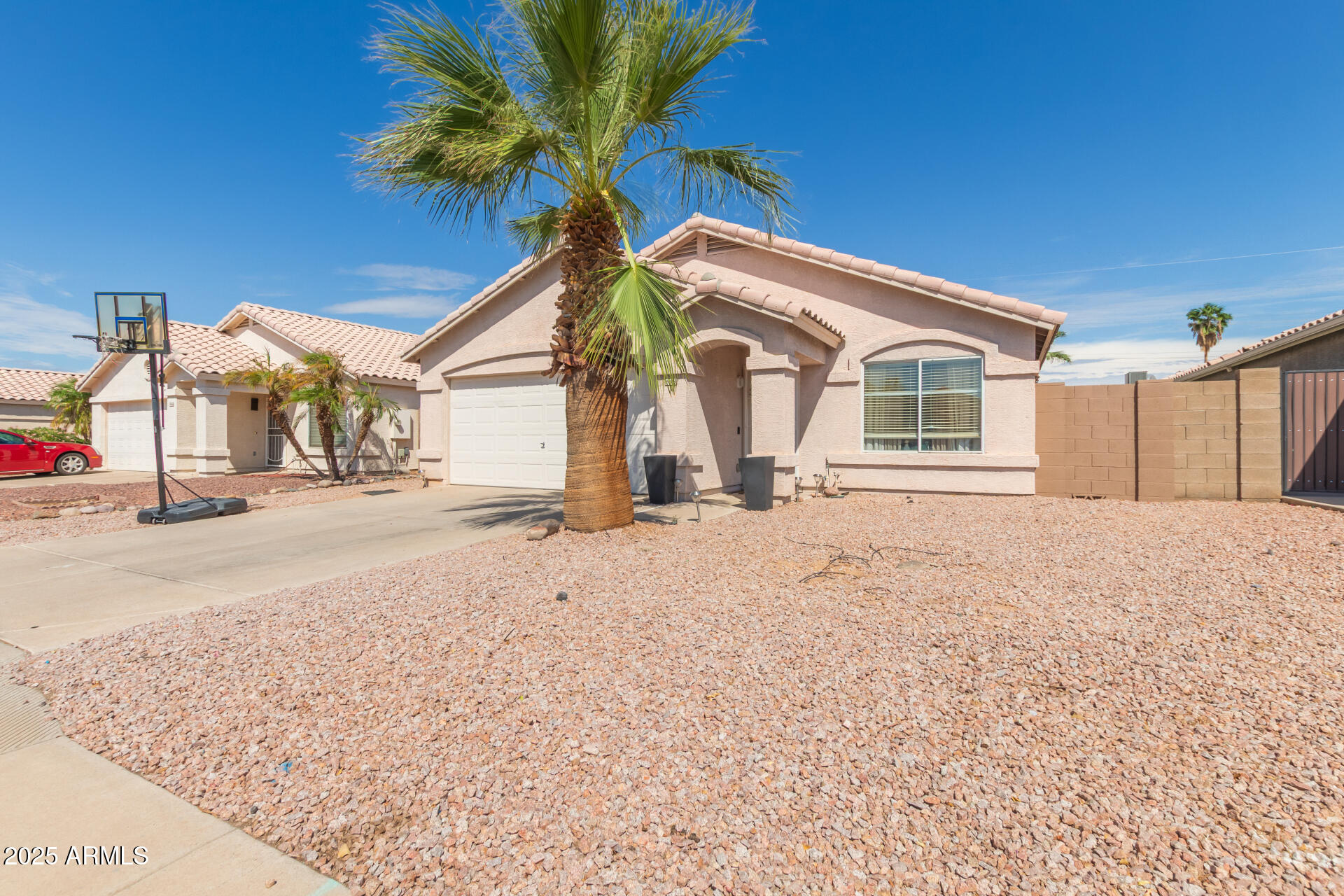 5008 Casper Road Mesa, AZ 85205 - Photo 2 of 25 a view of a house with a snow in the yard