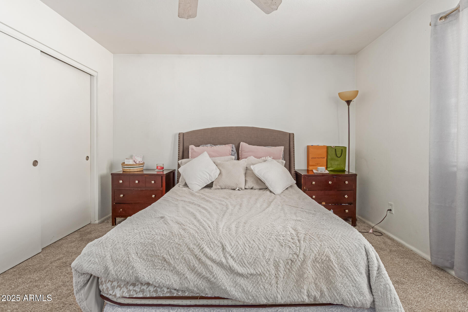 5008 Casper Road Mesa, AZ 85205 - Photo 9 of 25 a bedroom with a bed and wooden floor