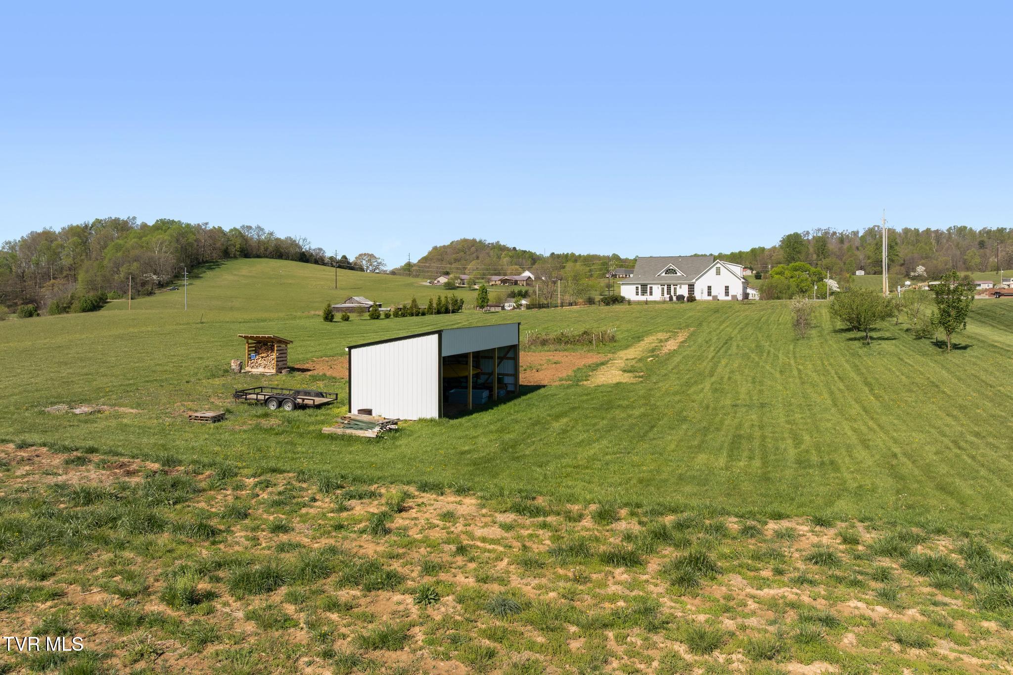 322 Arrowood Road Jonesborough, TN 37659 - Photo 53 of 58 Back yard with 5 acres