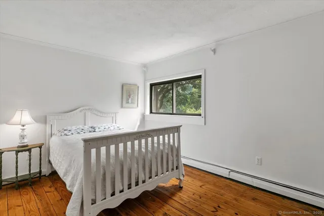a view of a big room with balcony and furniture