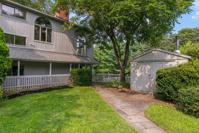 a view of a park with large trees