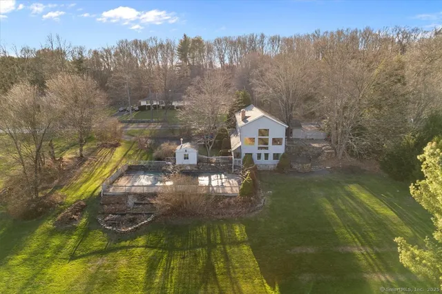 a view of a lake in middle of the house