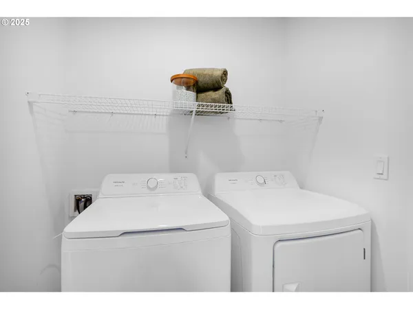 a utility room with dryer and washer