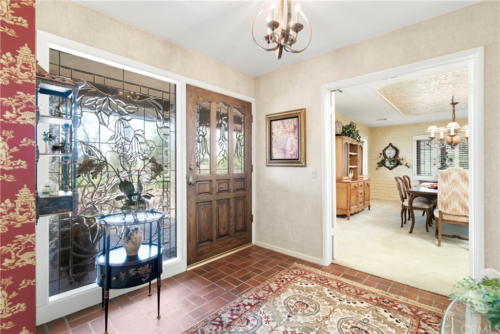 6800 Hawarden Drive Riverside, CA 92506 - Photo 11 of 57 a view of a room with furniture and chandelier