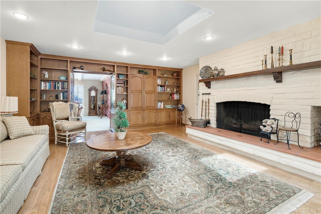 6800 Hawarden Drive Riverside, CA 92506 - Photo 19 of 57 a living room with furniture and a fireplace