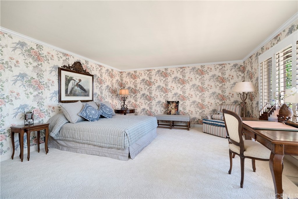 6800 Hawarden Drive Riverside, CA 92506 - Photo 25 of 57 a bedroom with a bed and a chair