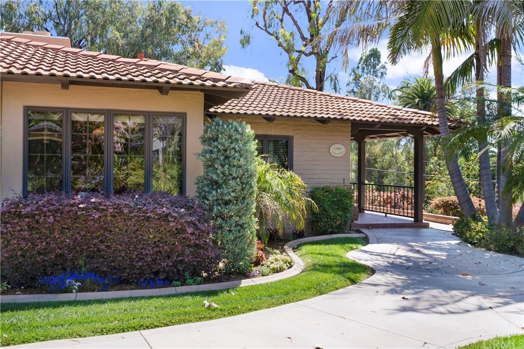6800 Hawarden Drive Riverside, CA 92506 - Photo 7 of 57 a front view of a house with garden