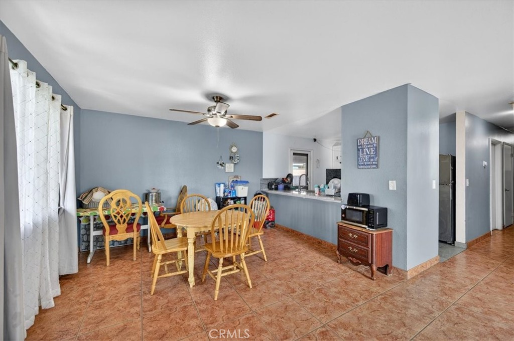 705 South C Madera, CA 93638 - Photo 13 of 50 a view of a dining room with furniture