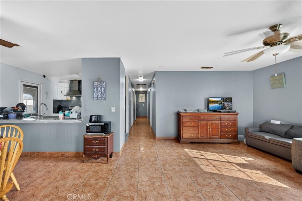 705 South C Madera, CA 93638 - Photo 14 of 50 a bedroom with furniture and a bed