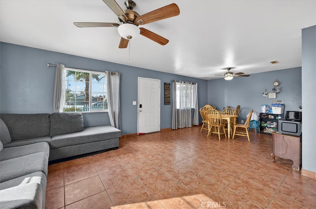 705 South C Madera, CA 93638 - Photo 18 of 50 a living room with furniture and a table