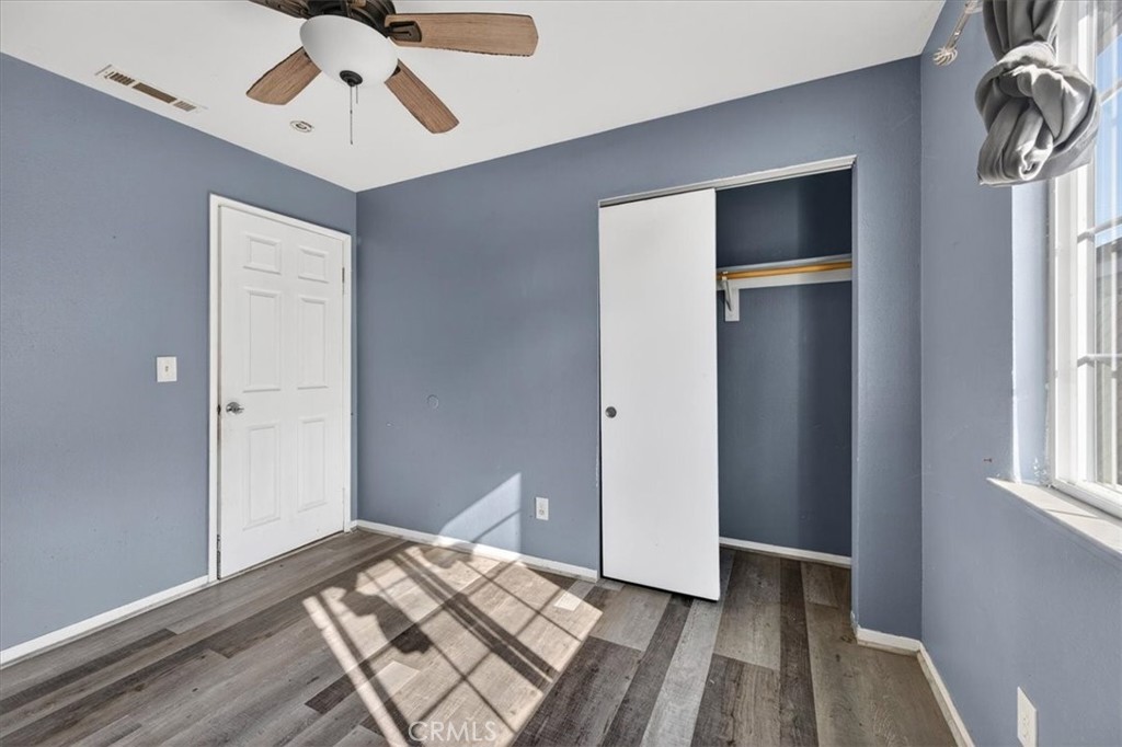 705 South C Madera, CA 93638 - Photo 25 of 50 a bedroom with a bed and a window