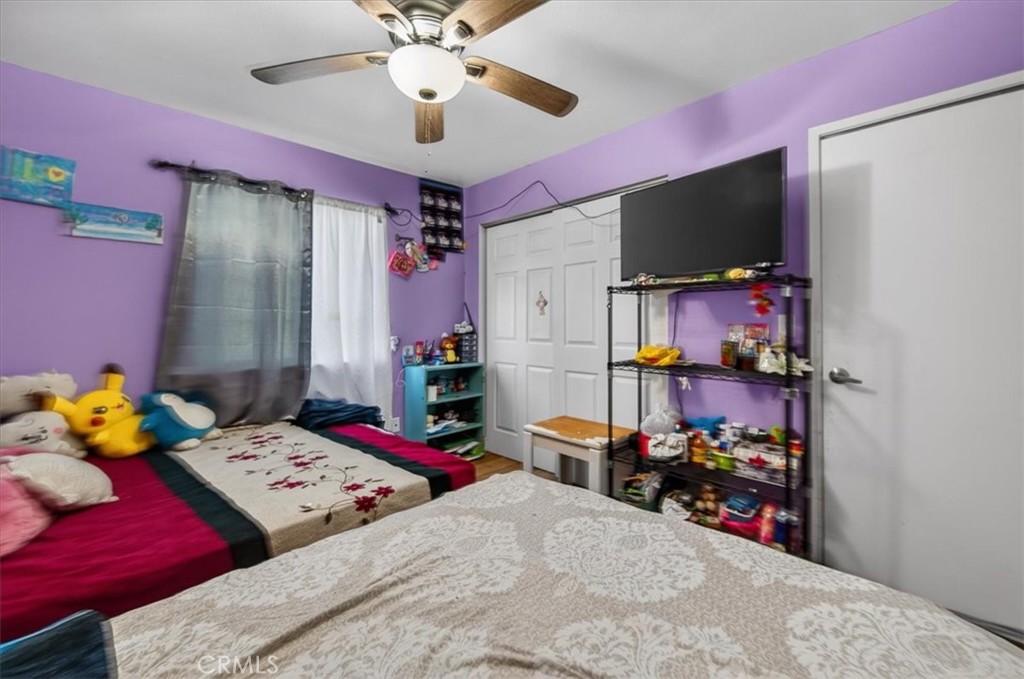 705 South C Madera, CA 93638 - Photo 33 of 50 a bedroom with a bed and a tv