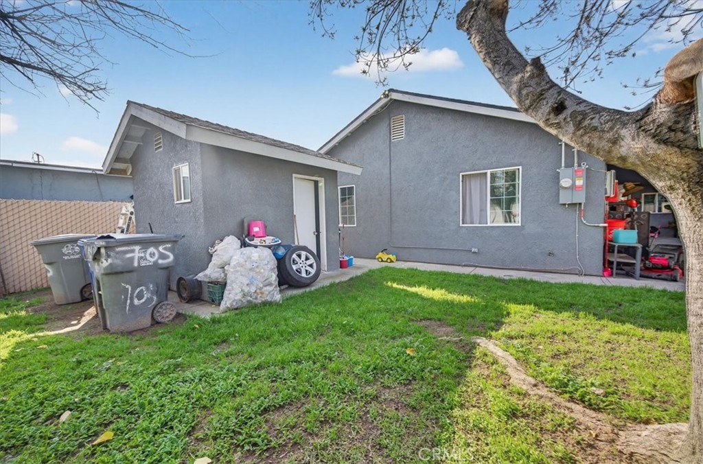 705 South C Madera, CA 93638 - Photo 40 of 50 a front view of a house with porch and garden