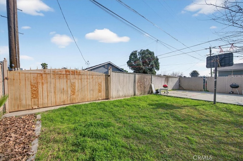 705 South C Madera, CA 93638 - Photo 45 of 50 a view of a backyard with a fence