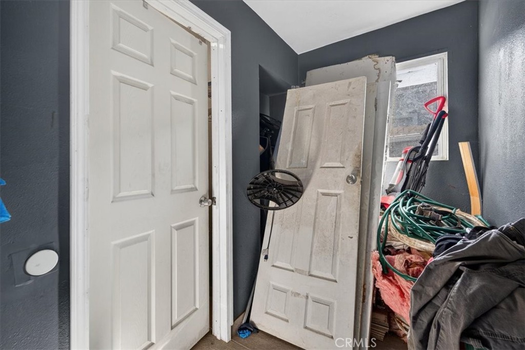 705 South C Madera, CA 93638 - Photo 49 of 50 a view of walk in closet with clothes and shoes