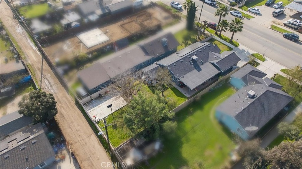 705 South C Madera, CA 93638 - Photo 8 of 50 a aerial view of a house with garden space and street view