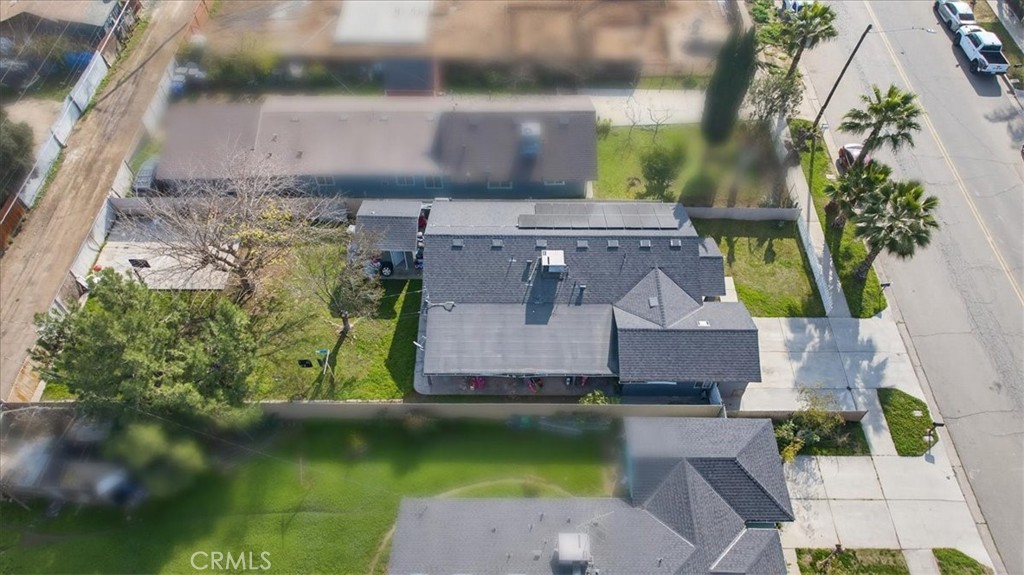 705 South C Madera, CA 93638 - Photo 9 of 50 an aerial view of a house with a garden