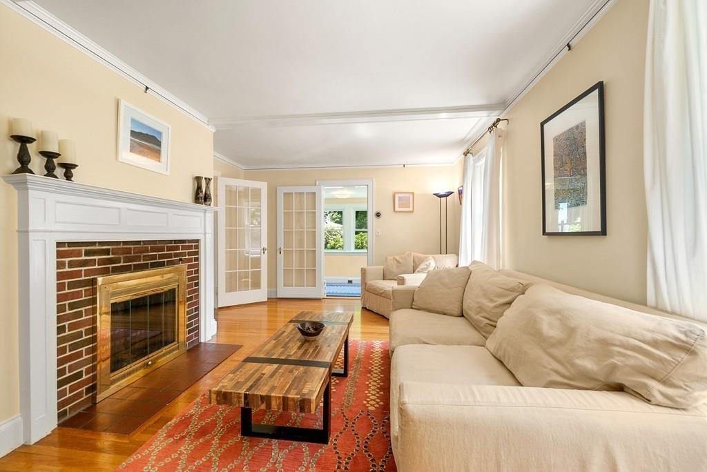 20 Cavanagh Road Wellesley, MA 02481 - Photo 13 of 28 a living room with furniture and a fireplace