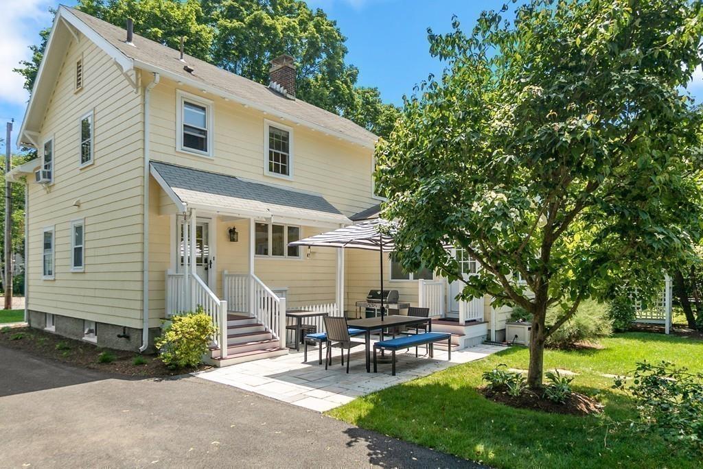 20 Cavanagh Road Wellesley, MA 02481 - Photo 26 of 28 a view of a house with patio and a garden