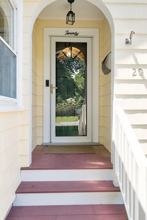 20 Cavanagh Road Wellesley, MA 02481 - Photo 4 of 28 a front view of a house with a window and a rug