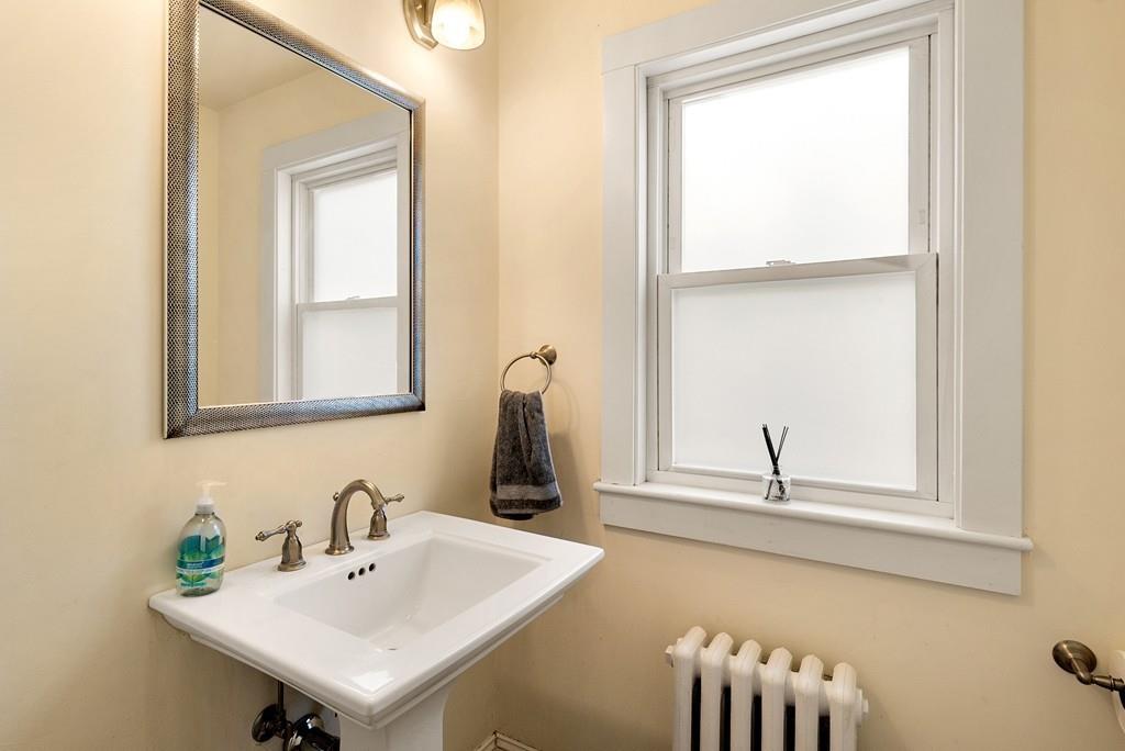20 Cavanagh Road Wellesley, MA 02481 - Photo 10 of 28 a bathroom with a sink and a mirror